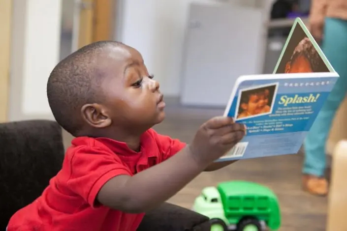 Ch-Disc-Cen-MTP-6558 Children’s Discovery Center black boy reading